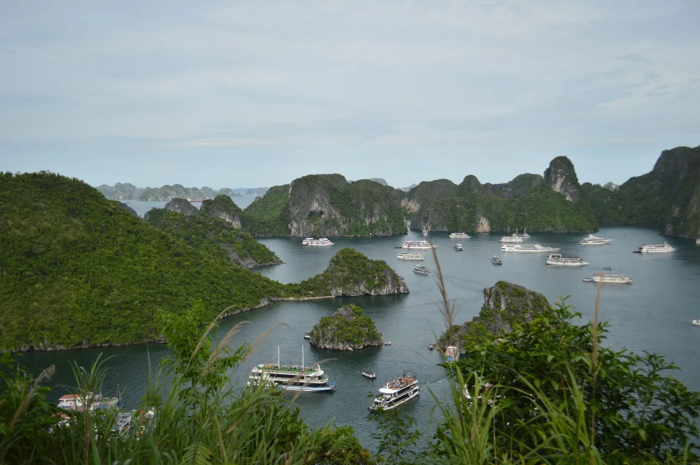 Boats among the limestone islands of Ha Long Bay