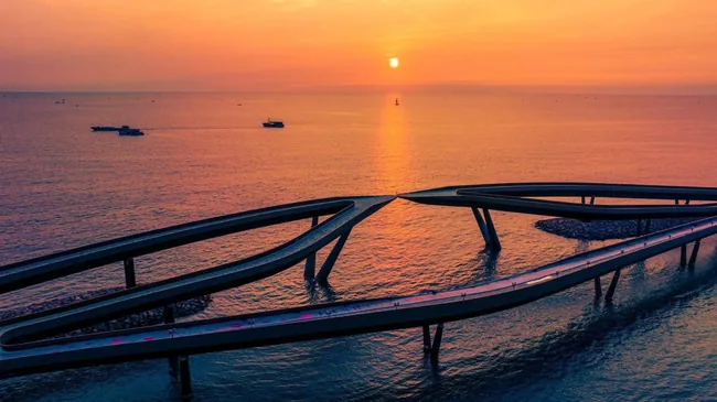 Sunset over a coastal bridge in Vietnam